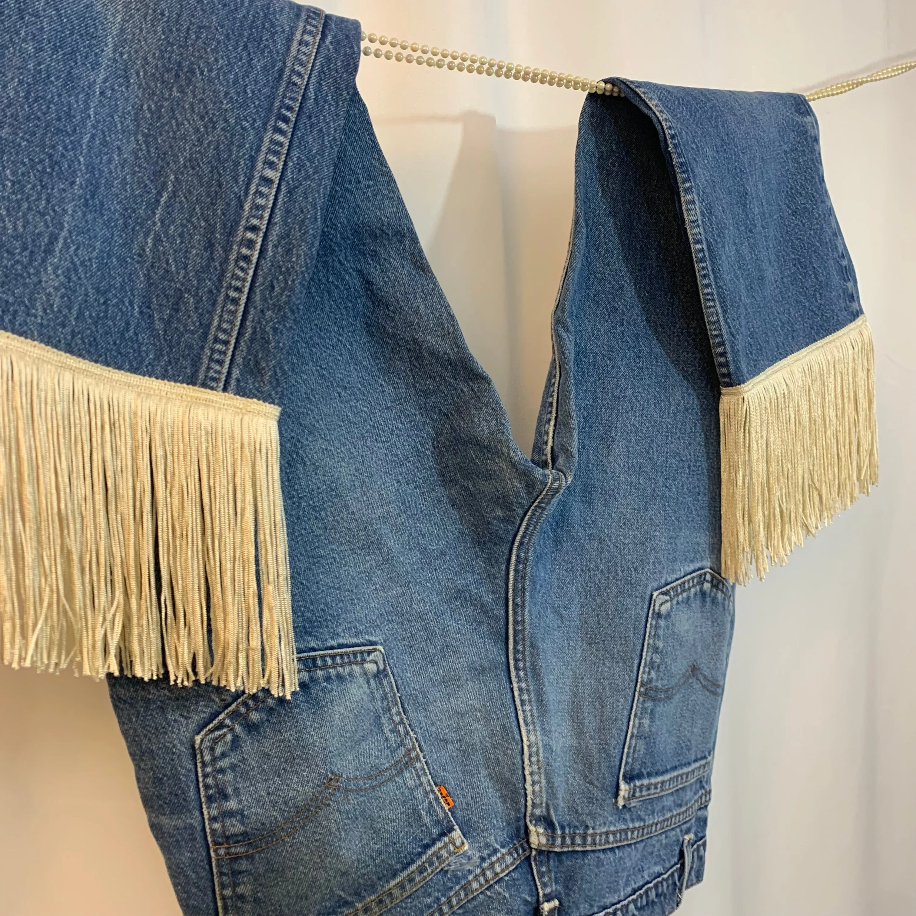 Upcycled 517 fringe jeans